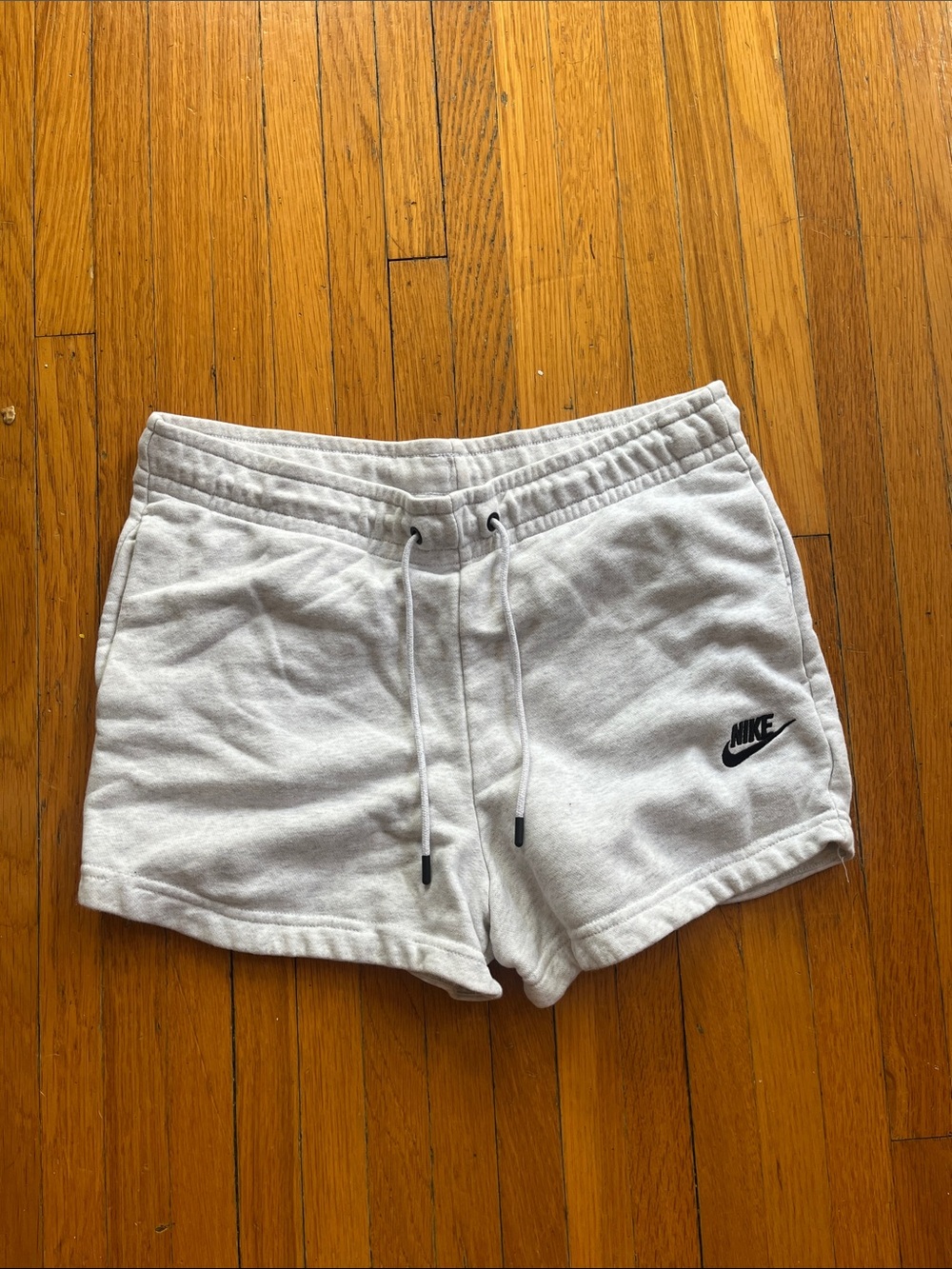 Nike Women's Light Gray Athletic Fleece Shorts with Black Logo